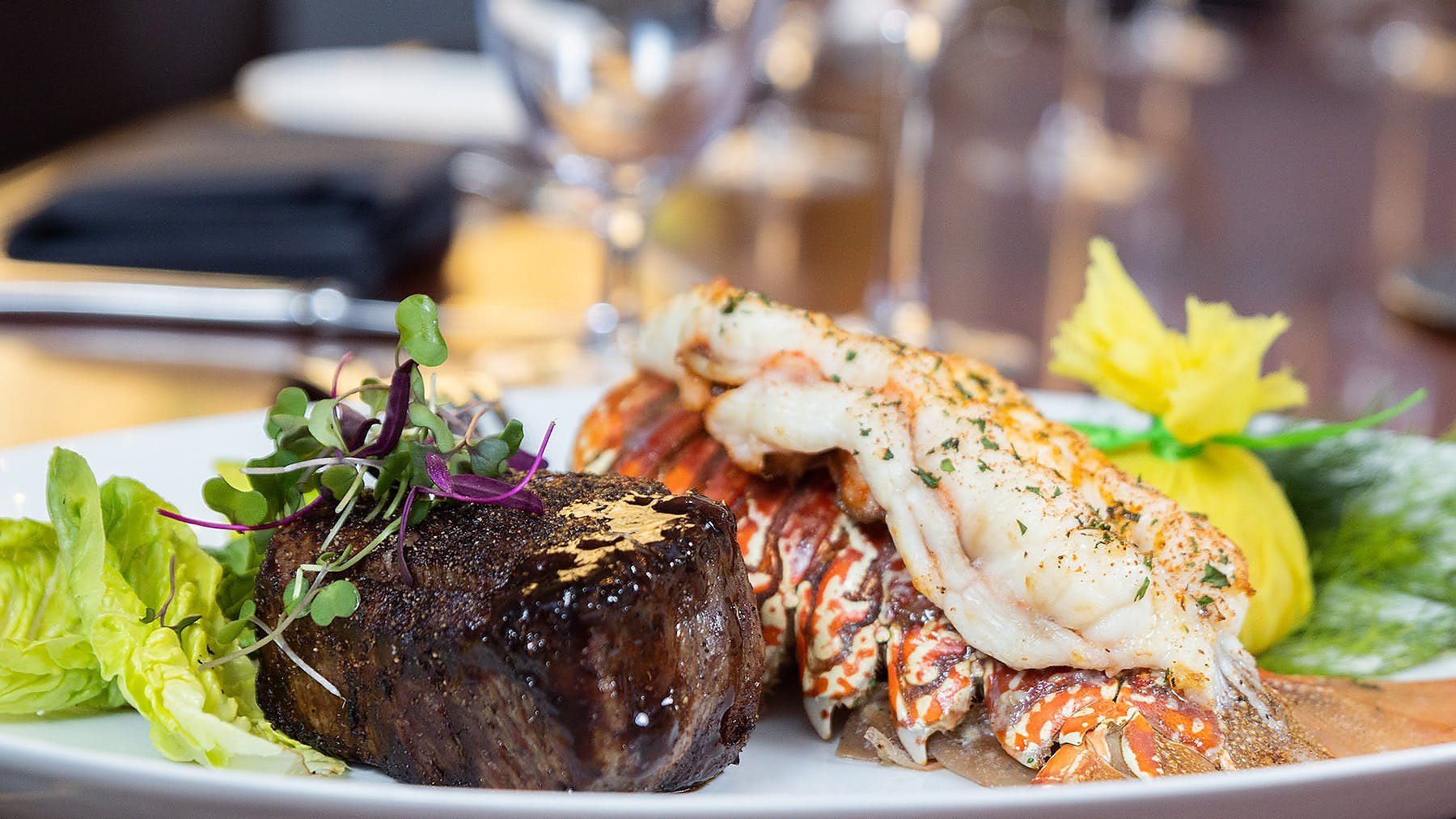 Filet mignon served with a lobster tail at OldeStone Steakhouse